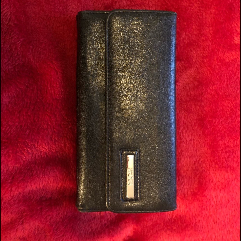 2/$20 item. Kenneth Cole Reaction black wallet.